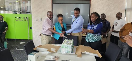 Cake cutting celebration for CQ Go-live at KCB